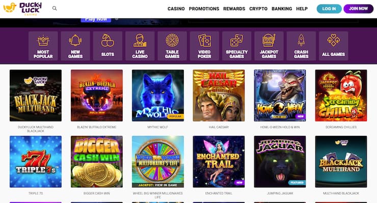 A screenshot of Ducky Luck Casino real money lobby showing slot titles, blackjack, and specialty game categories.